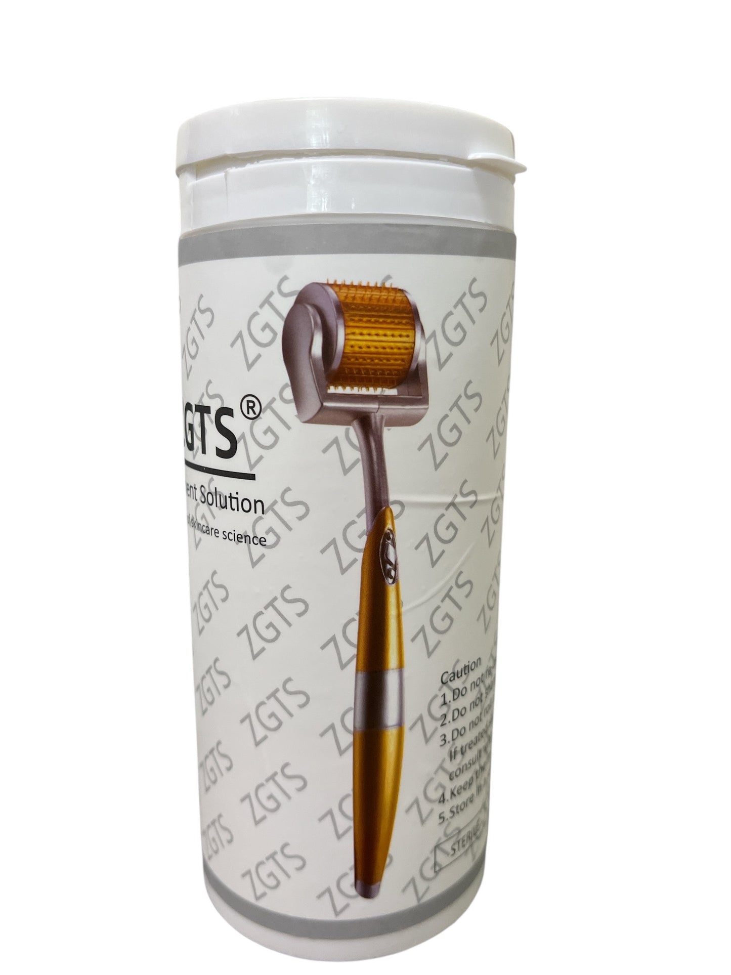 ZGTS microneedling roller in sterile clinical container – gold and silver design for at-home skin therapy.