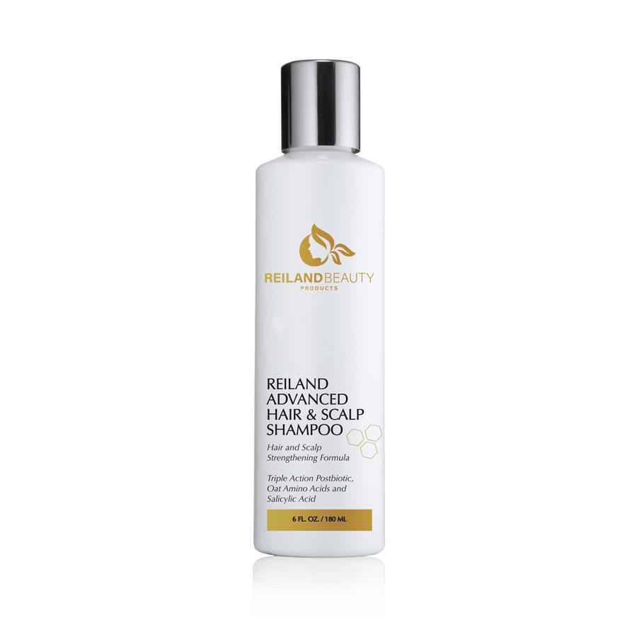 Reiland Advanced Hair & Scalp Shampoo – 6 fl. oz. bottle featuring Triple Action Postbiotic, Oat Amino Acids, and Salicylic Acid. Strengthens scalp, reduces buildup, and supports healthy hair growth.