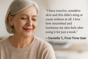Testimonial image of Danielle T., a mature woman with radiant skin, sharing her experience using Reiland Radiance Renewal Elixir. Suitable for sensitive skin, leaves complexion nourished and luminous.