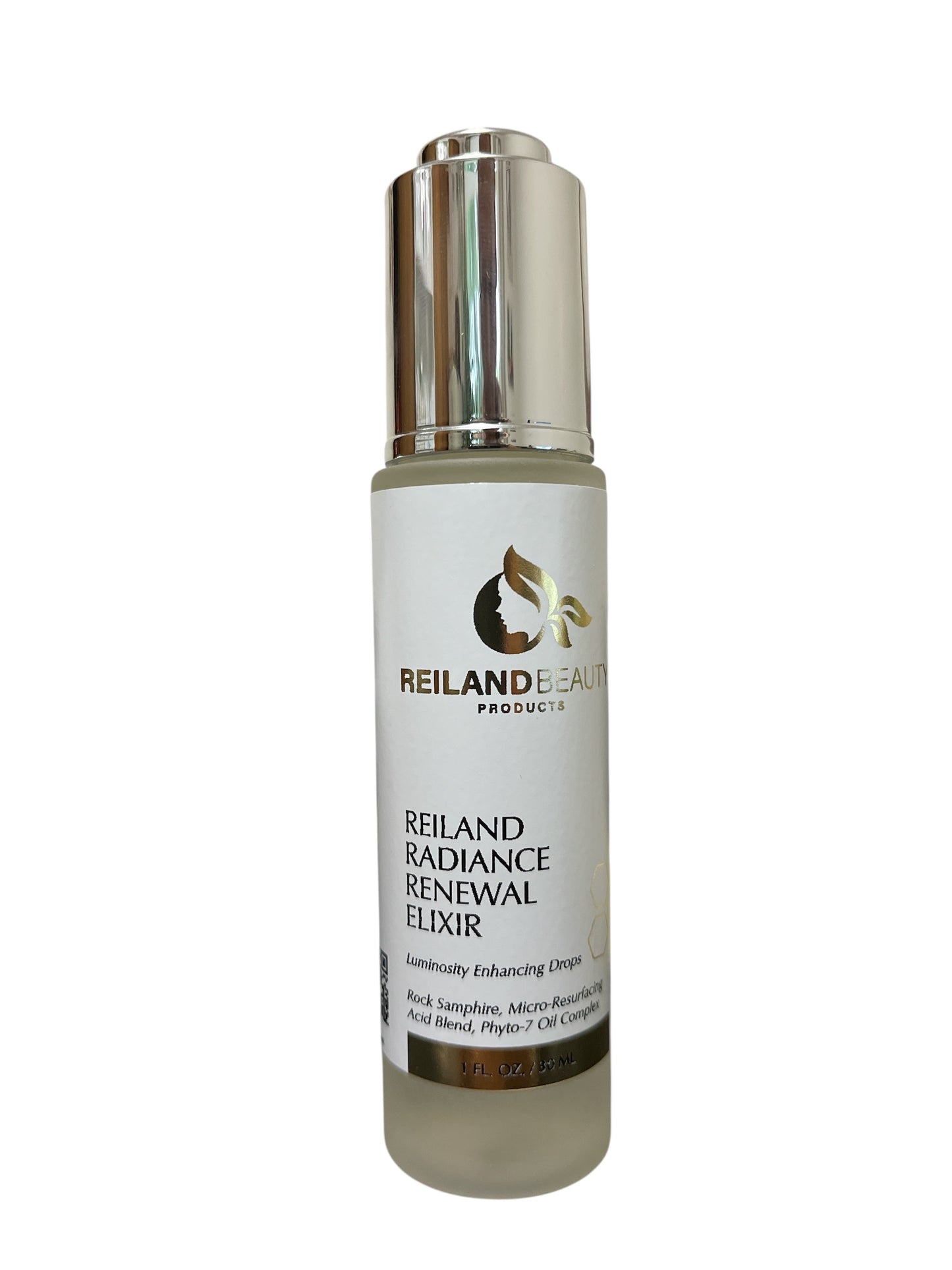 A close-up of Reiland Radiance Renewal Elixir on a clean white background, showcasing its luxury packaging and key ingredients like Rock Samphire and the Phyto-7 Oil Complex.